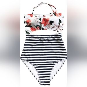 Womens bathing suit.  Halter design, double ties in back, one piece, padded